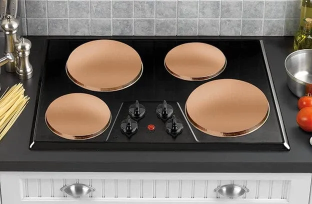 Copper Burner Covers by Reston Lloyd